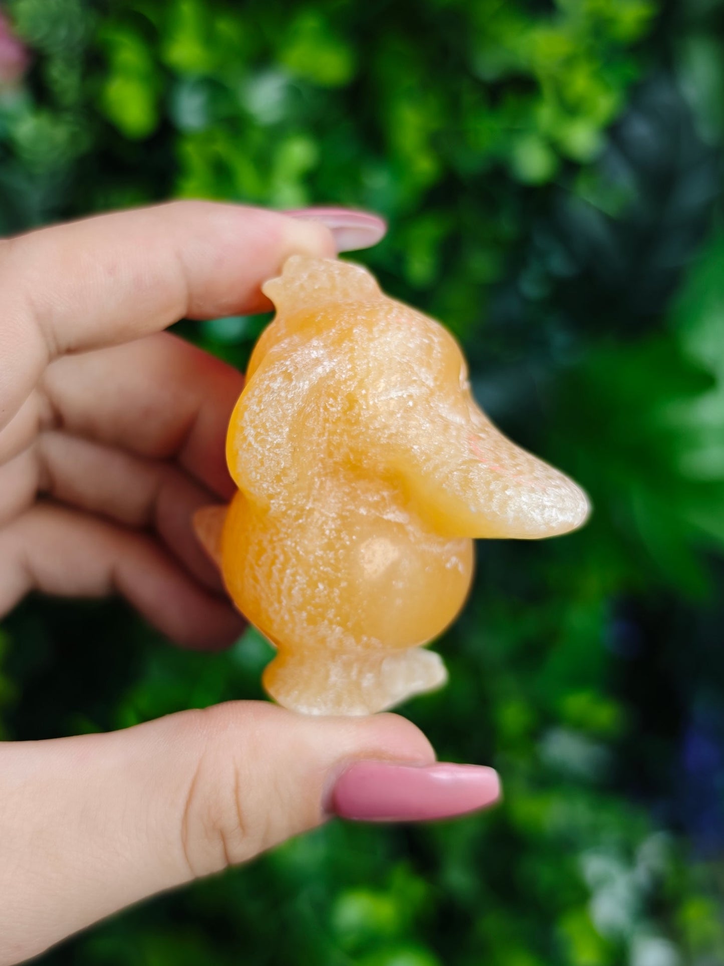 Orange Calcite Psyduck Carving