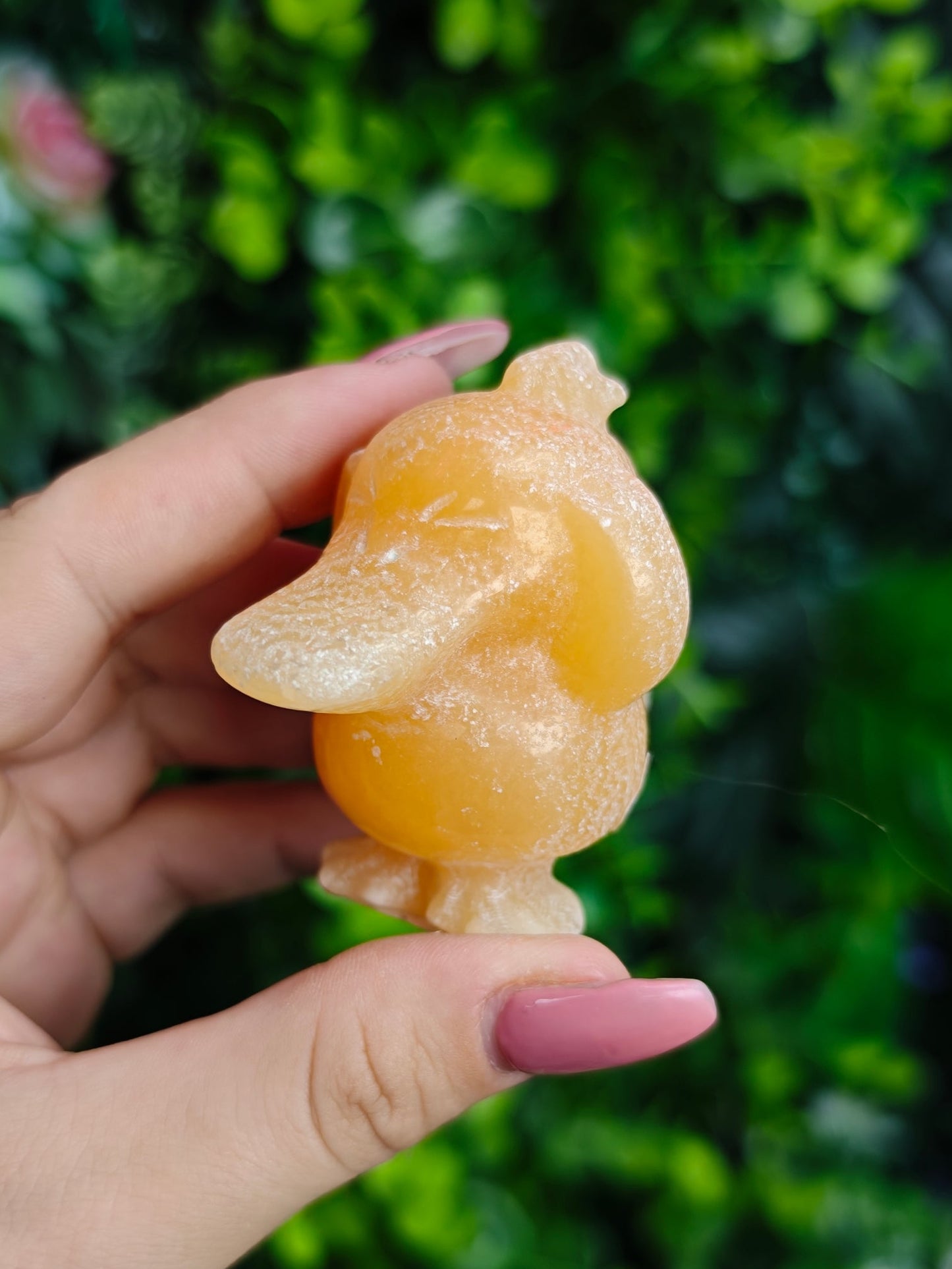 Orange Calcite Psyduck Carving