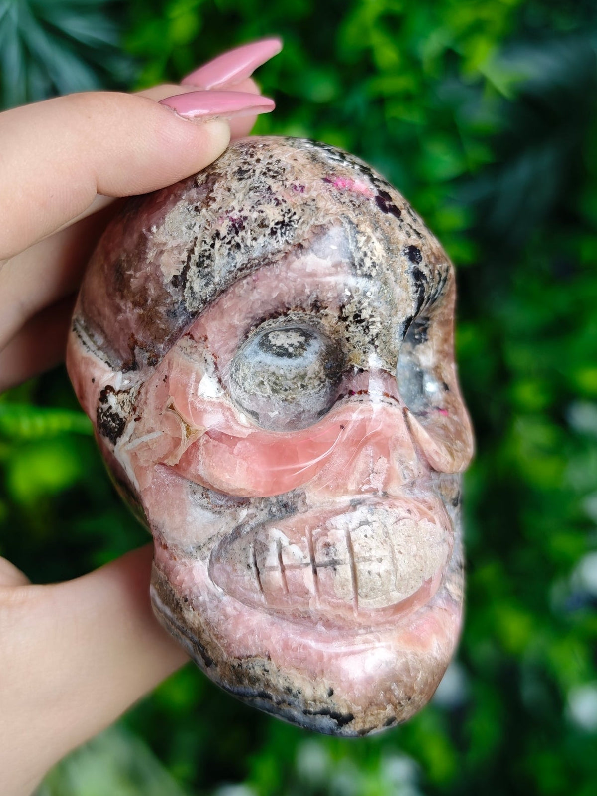 Rhodochrosite Skull Carving