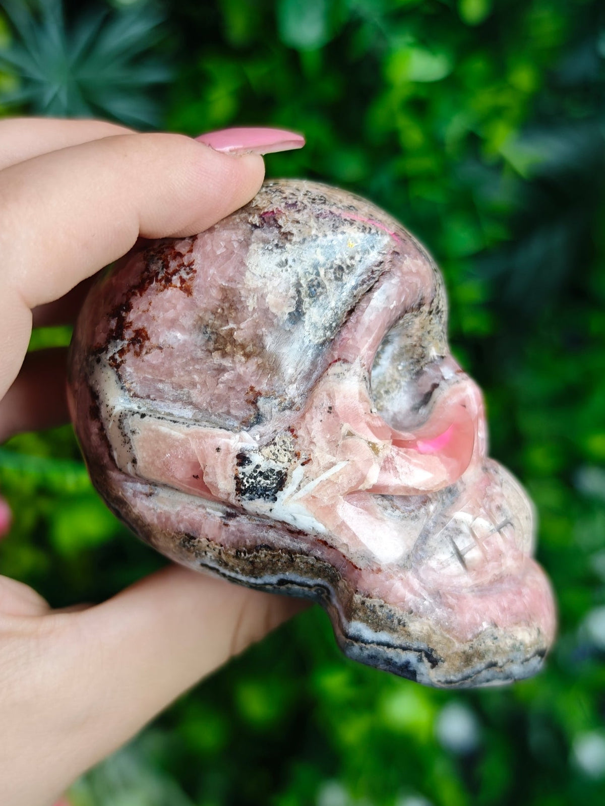 Rhodochrosite Skull Carving