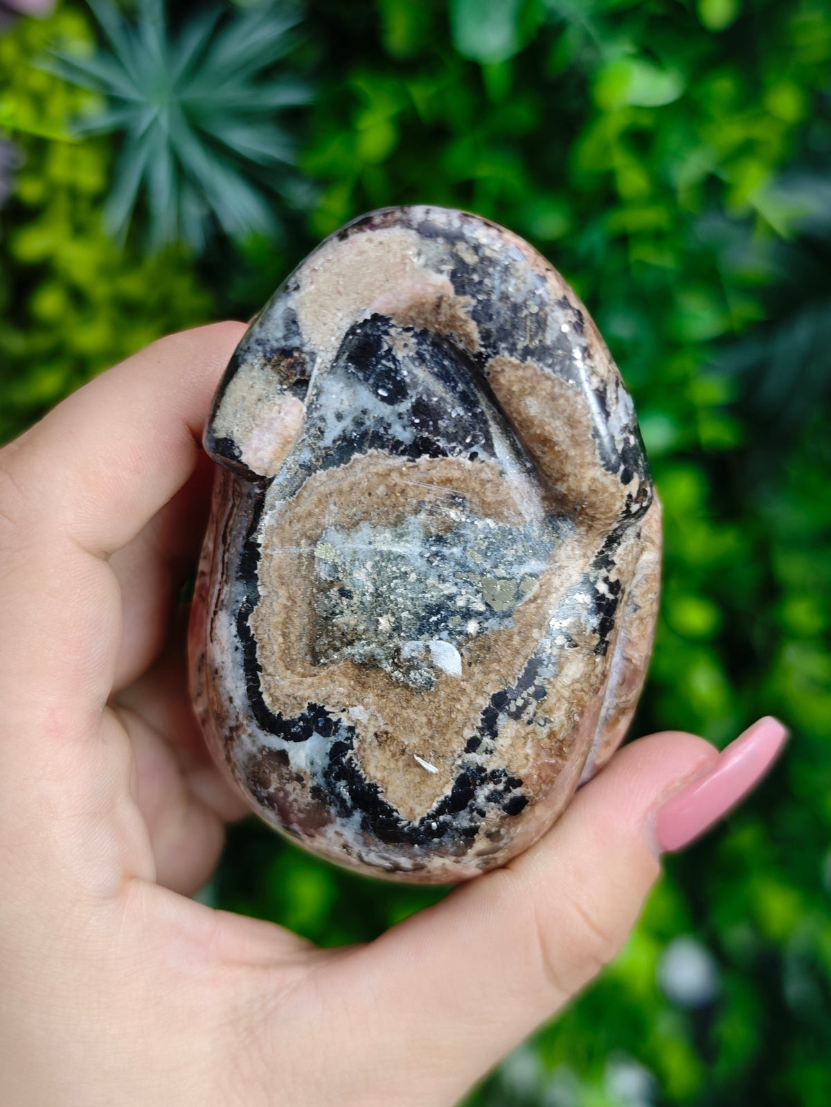 Rhodochrosite Skull Carving